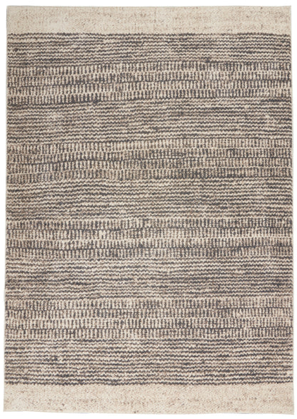 Rectangular beige and brown woven rug (3' x 5') with textured horizontal stripes and a soft, shaggy surface.
