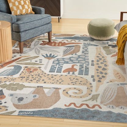 Abstract patterned soft-pile area rug in blue, beige and gray with nature-inspired shapes; 7' x 9'.