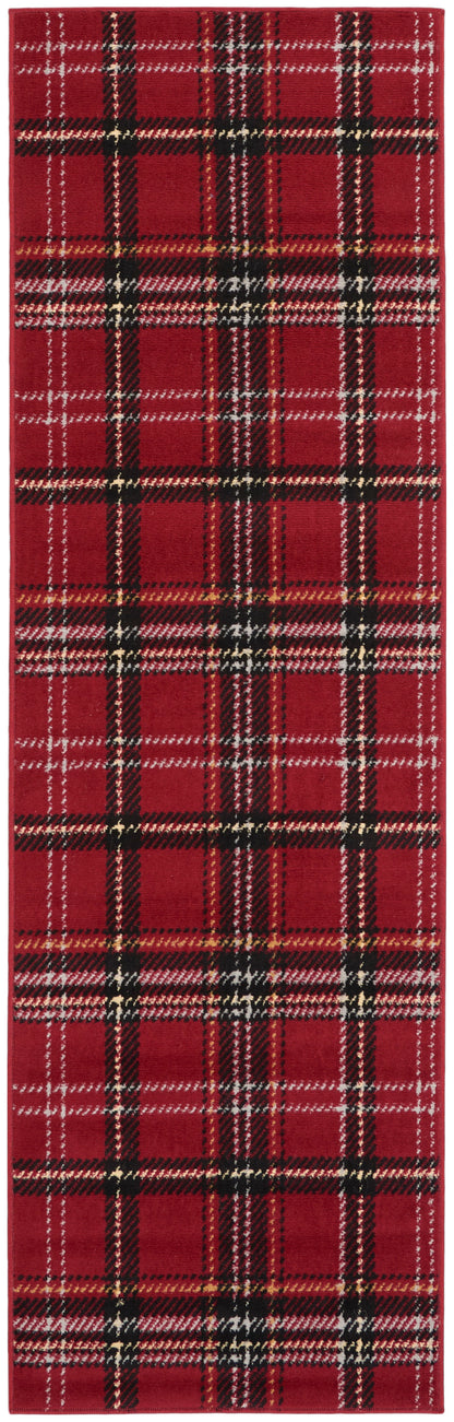 Red plaid runner rug with black, white, and gold stripes.