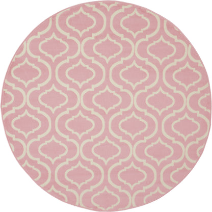 Round pink rug with cream trellis pattern.