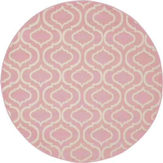 Round pink rug with cream trellis pattern.