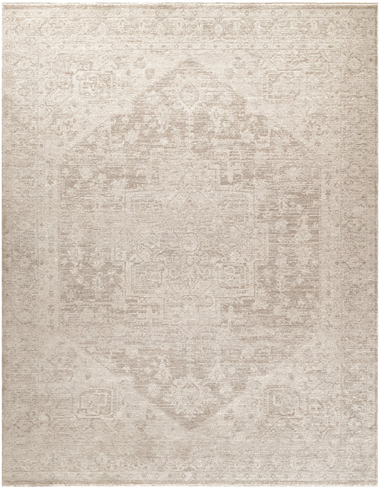 Rectangular beige distressed rug with subtle vintage medallion pattern; neutral, soft-textured decor rug.