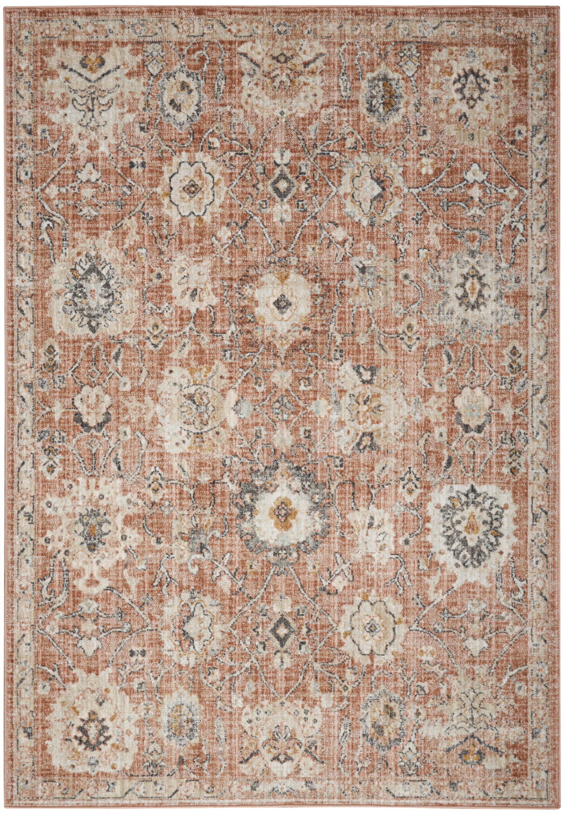 Rust-orange oriental area rug with ivory and blue floral medallions, distressed vintage finish.