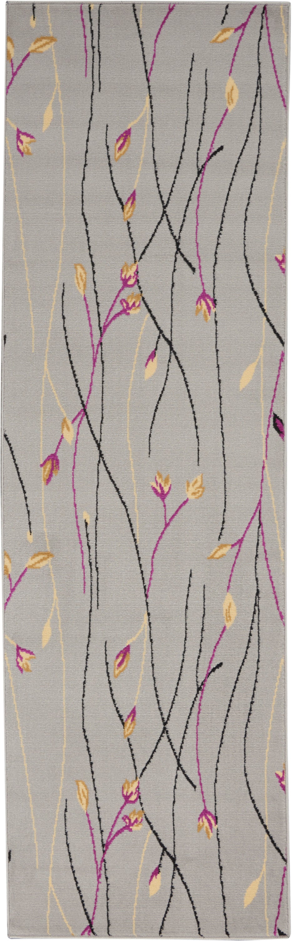 Rectangular gray area rug with black and magenta twisting branches and pale yellow leaves in a modern botanical print.