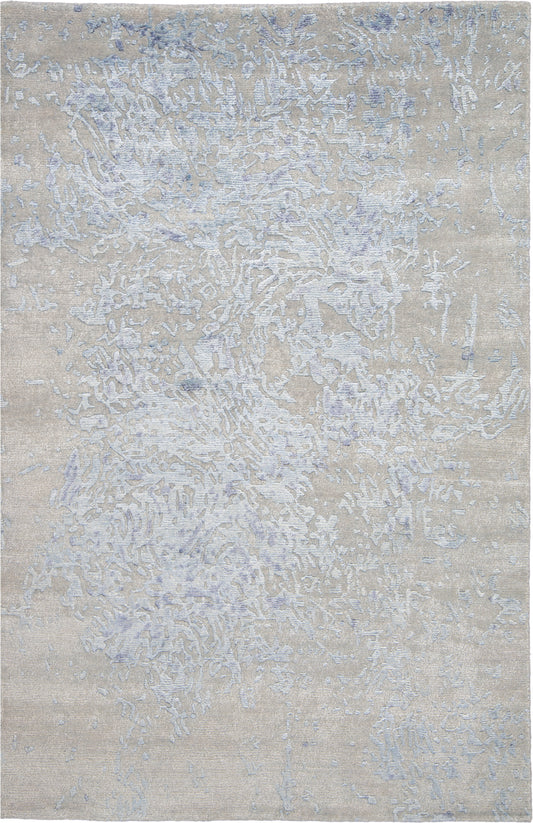 Beige area rug with light lavender-gray abstract pattern, soft plush texture, contemporary style.