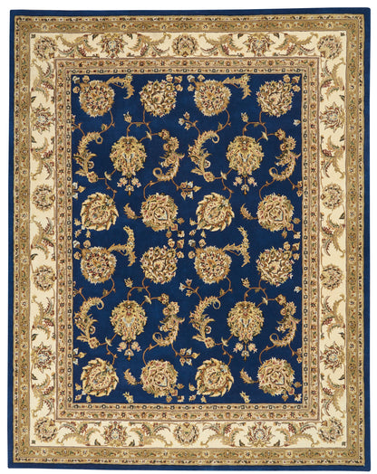 Traditional oriental rug with deep blue field and gold floral motifs, cream/beige borders for classic floor decor.