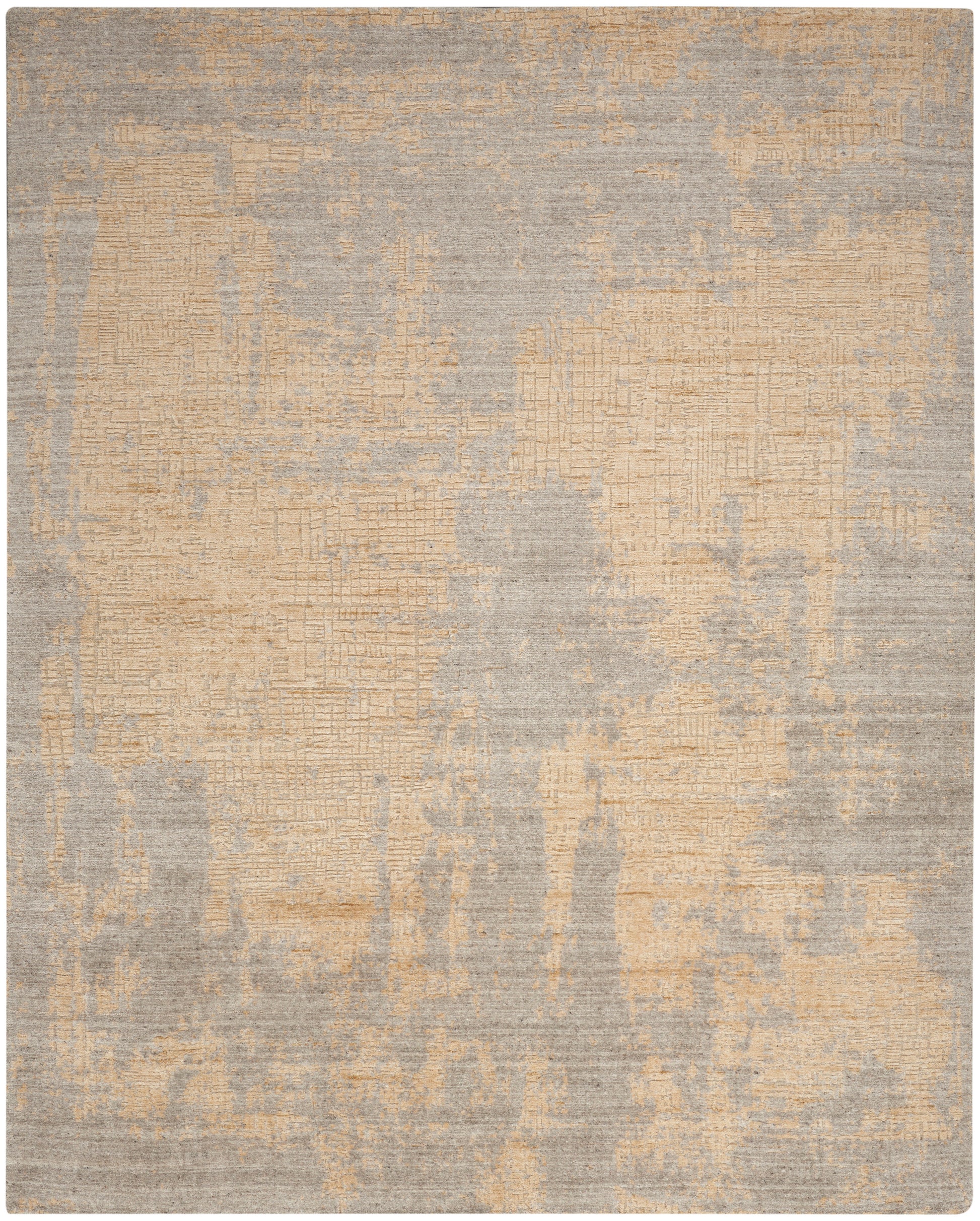 Beige and gray distressed area rug with irregular patchwork texture and muted tones.