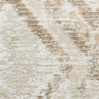 Cream and beige shag rug with soft, fluffy pile and abstract, earthy pattern.