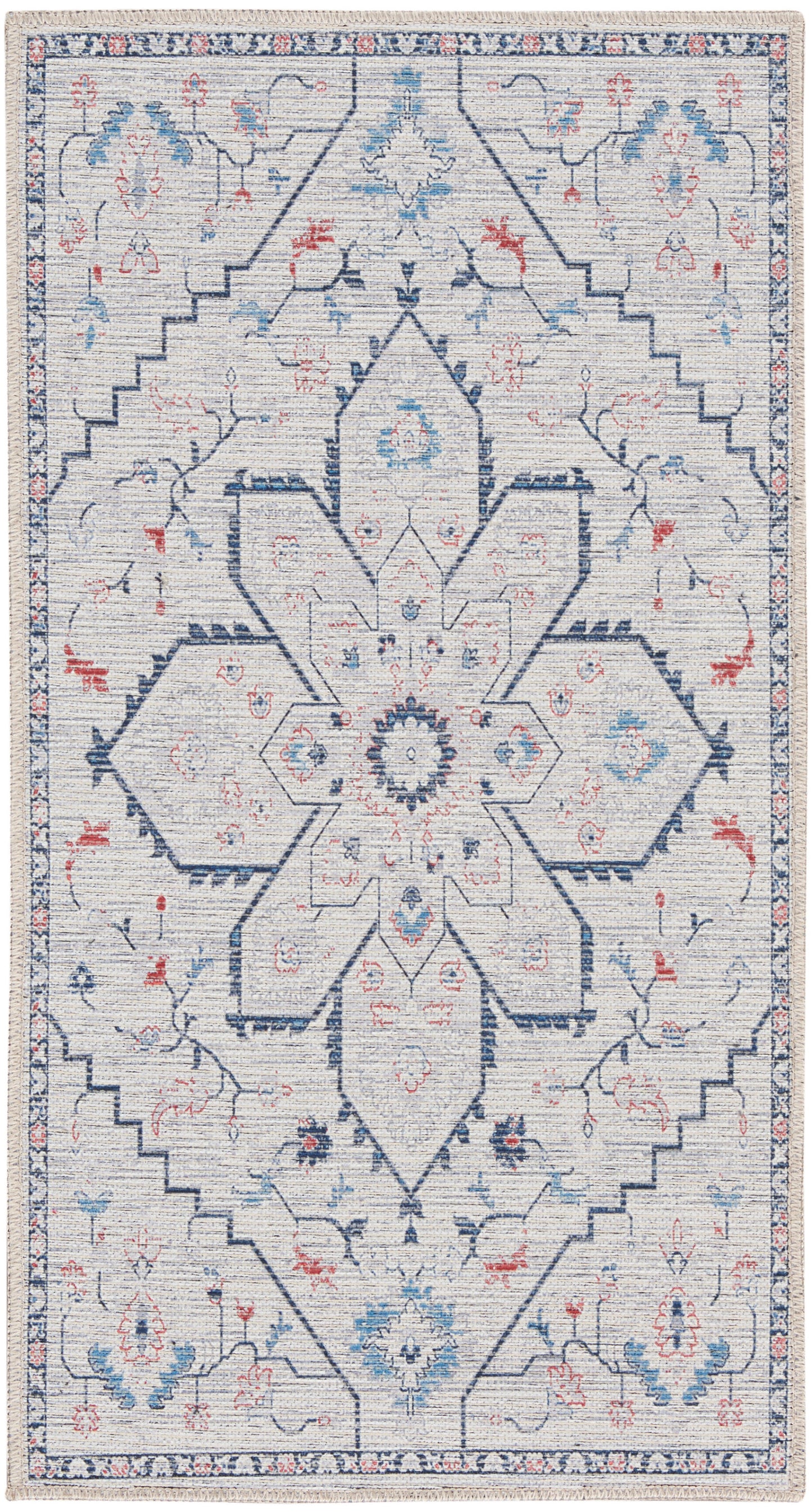 Ivory area rug with blue and red geometric floral medallion, farmhouse style, fringed edges