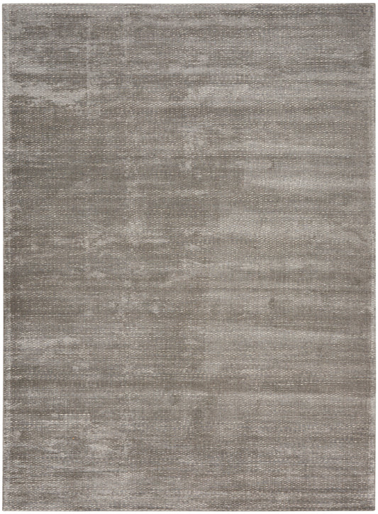 Rectangular gray distressed area rug with subtle tonal pattern and soft pile; modern contemporary style.