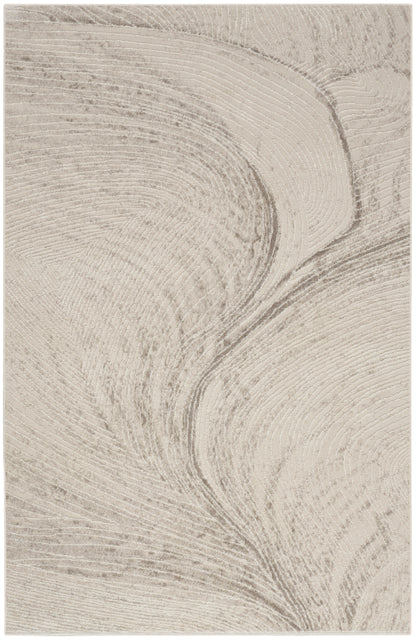 Beige area rug with abstract, swirling taupe pattern and a soft, textured weave.