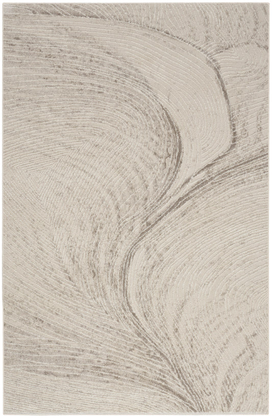 Beige area rug with abstract, swirling taupe pattern and a soft, textured weave.
