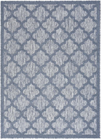 Gray-blue area rug with a repeating trellis/quatrefoil lattice and textured woven surface; rectangular indoor decoration.