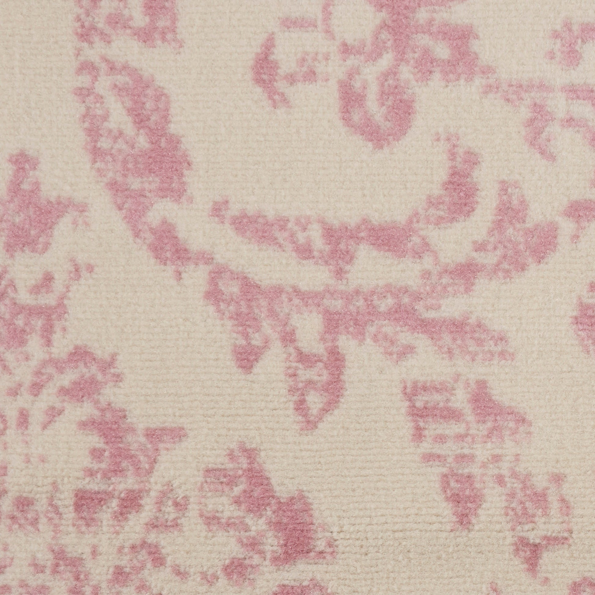 Cream-beige fabric with pink damask floral pattern, vintage upholstery textile.