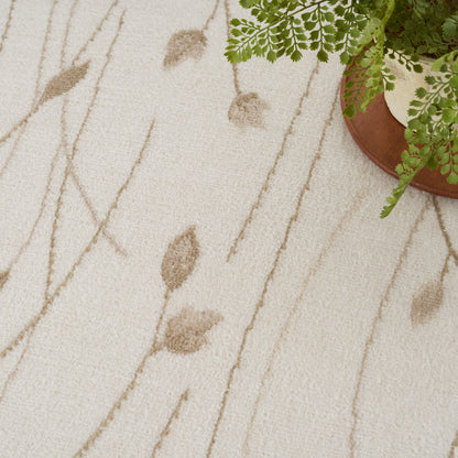 Beige textured rug with light brown fern leaf patterns and wavy lines; a potted fern in a terracotta pot sits at top-right.