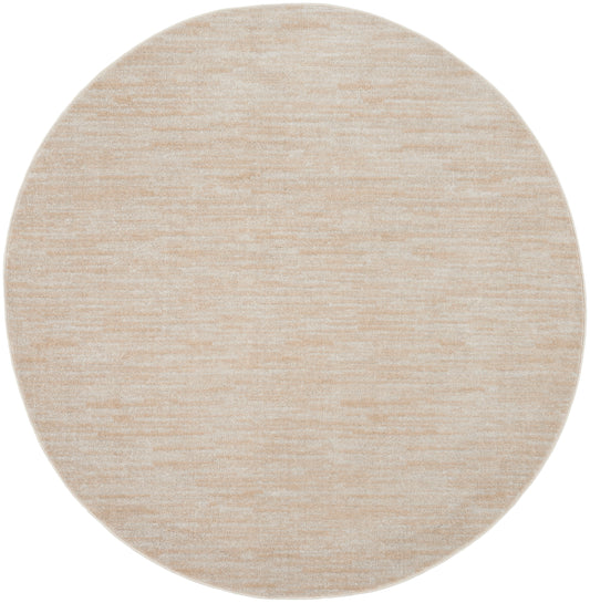 Round beige outdoor rug with a subtle marled texture, 6' round.