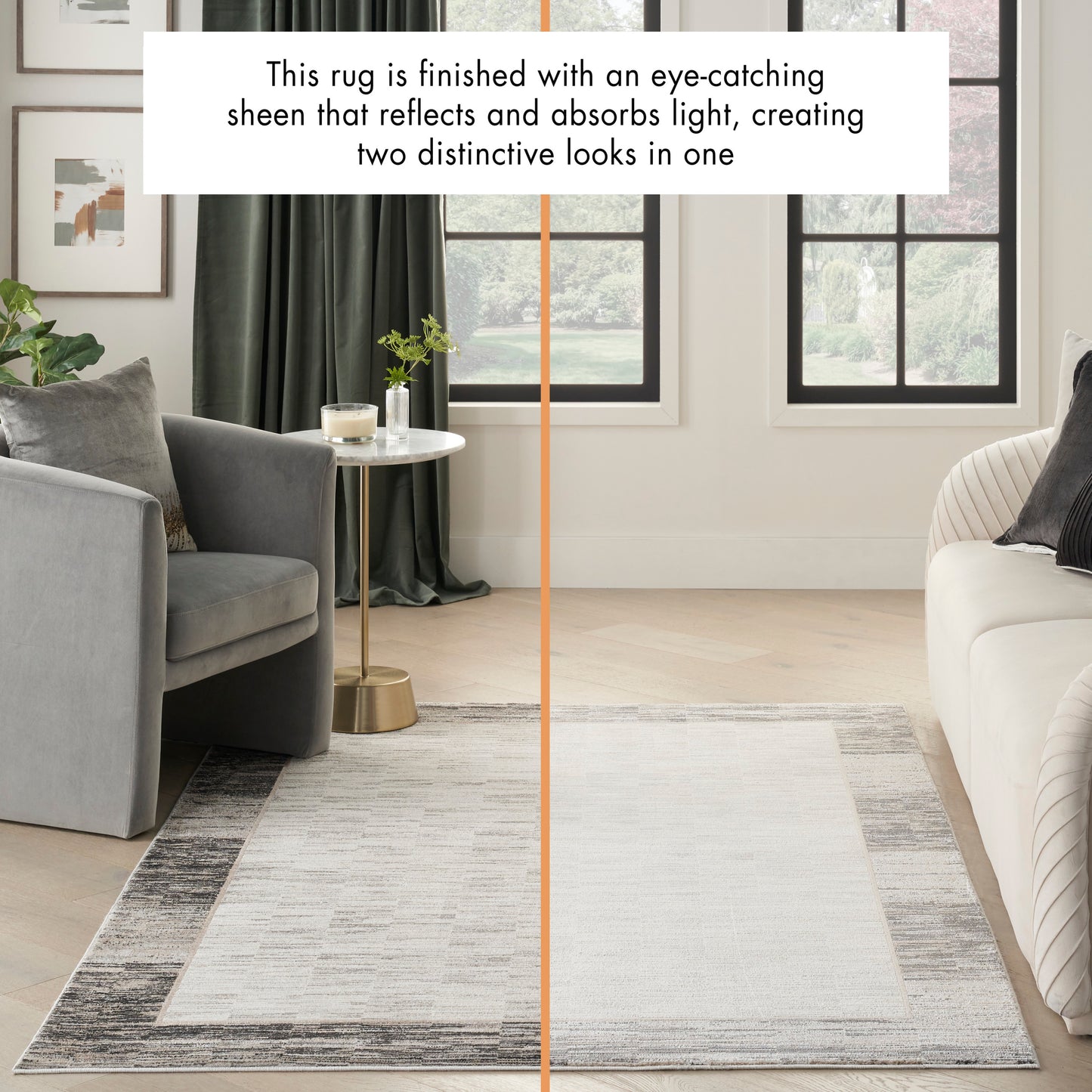 Rectangular area rug with light gray center and darker border in a modern living room with gray seating and gold side table.