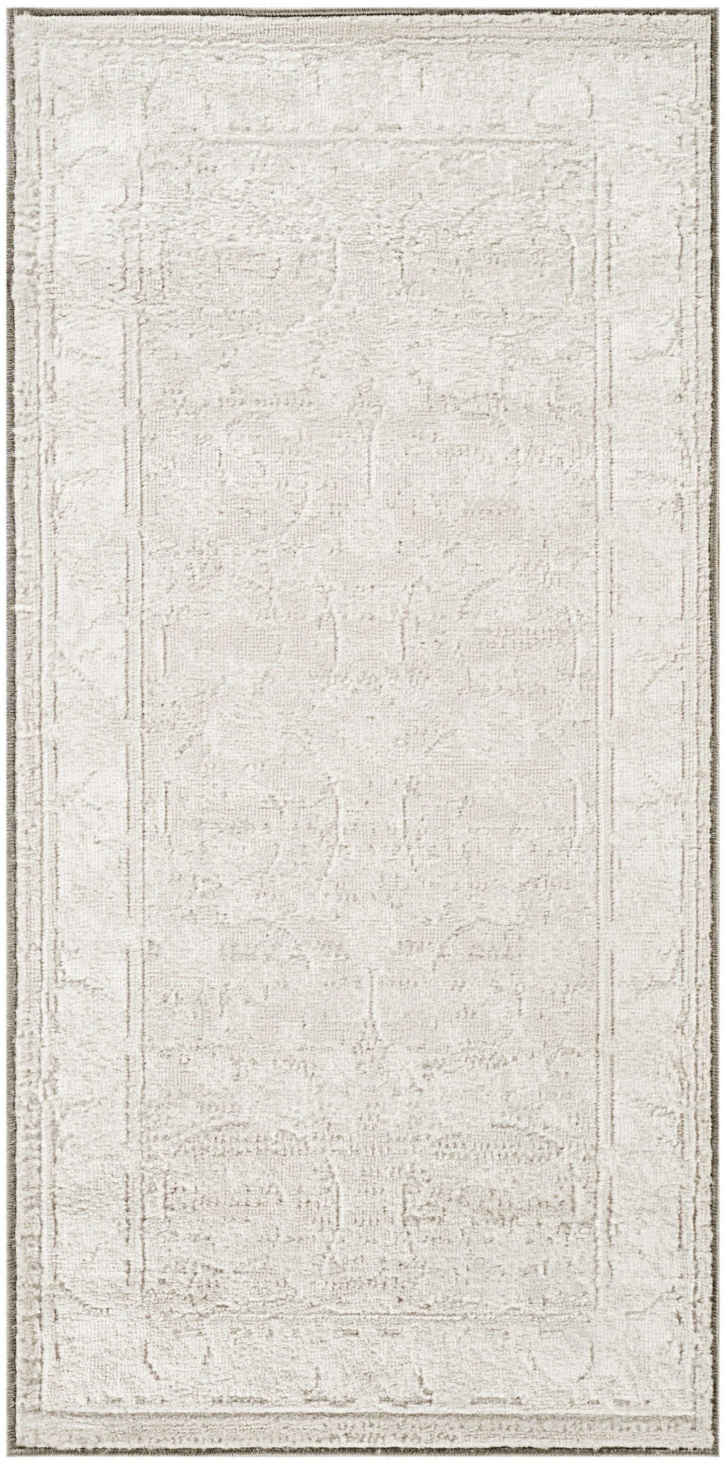 Rectangular light beige distressed area rug with a subtle geometric border and soft faded pattern.