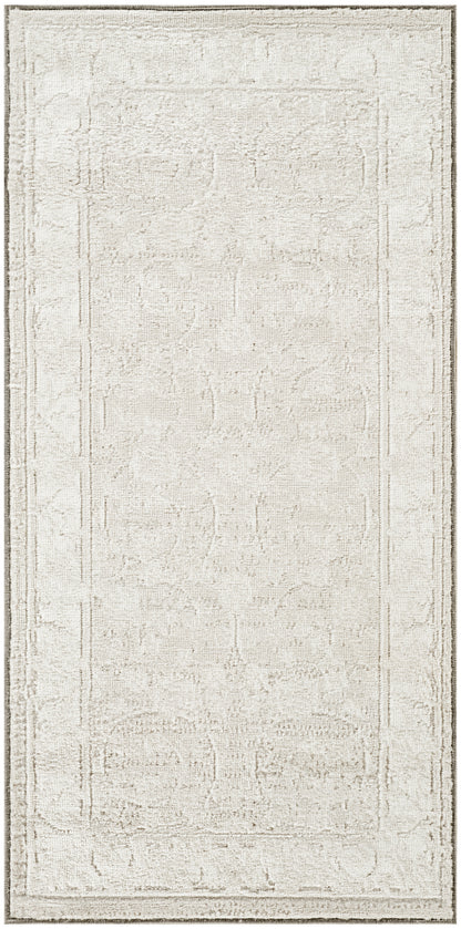 Rectangular light beige distressed area rug with a subtle geometric border and soft faded pattern.