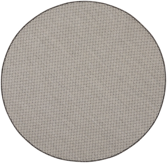 Round grey rug.