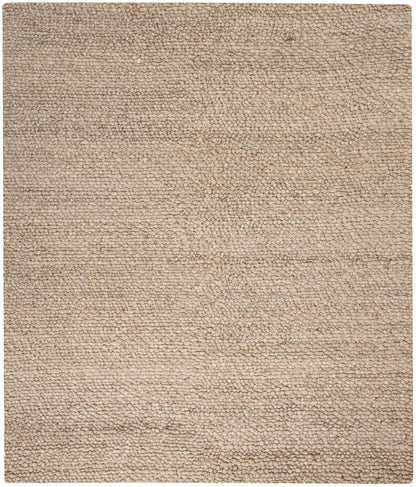 Beige textured shag rug with dense loop pile; soft neutral rug.