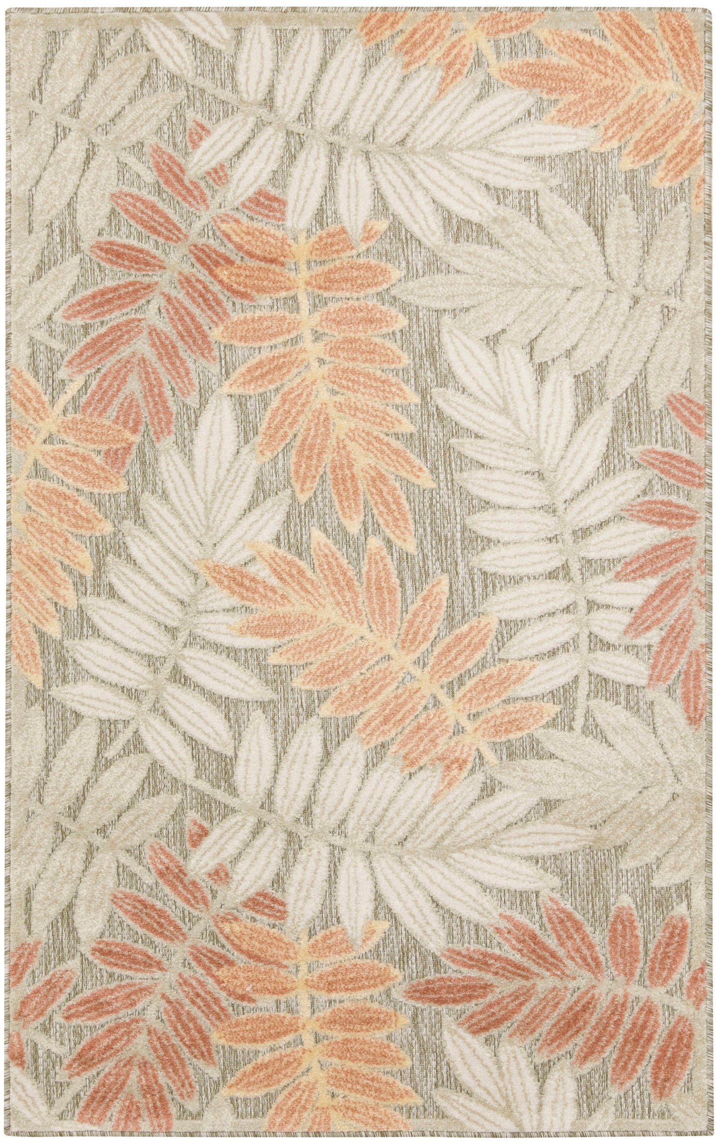 Soft beige rug with peach and cream tropical leaf pattern; woven texture for indoor floor decor.
