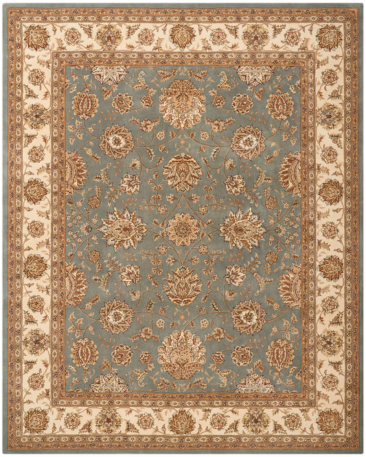 Persian-style area rug with blue field and ornate cream border in gold-toned floral design.