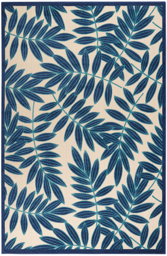 Rectangular rug featuring navy palm leaves on a cream background with a navy border.