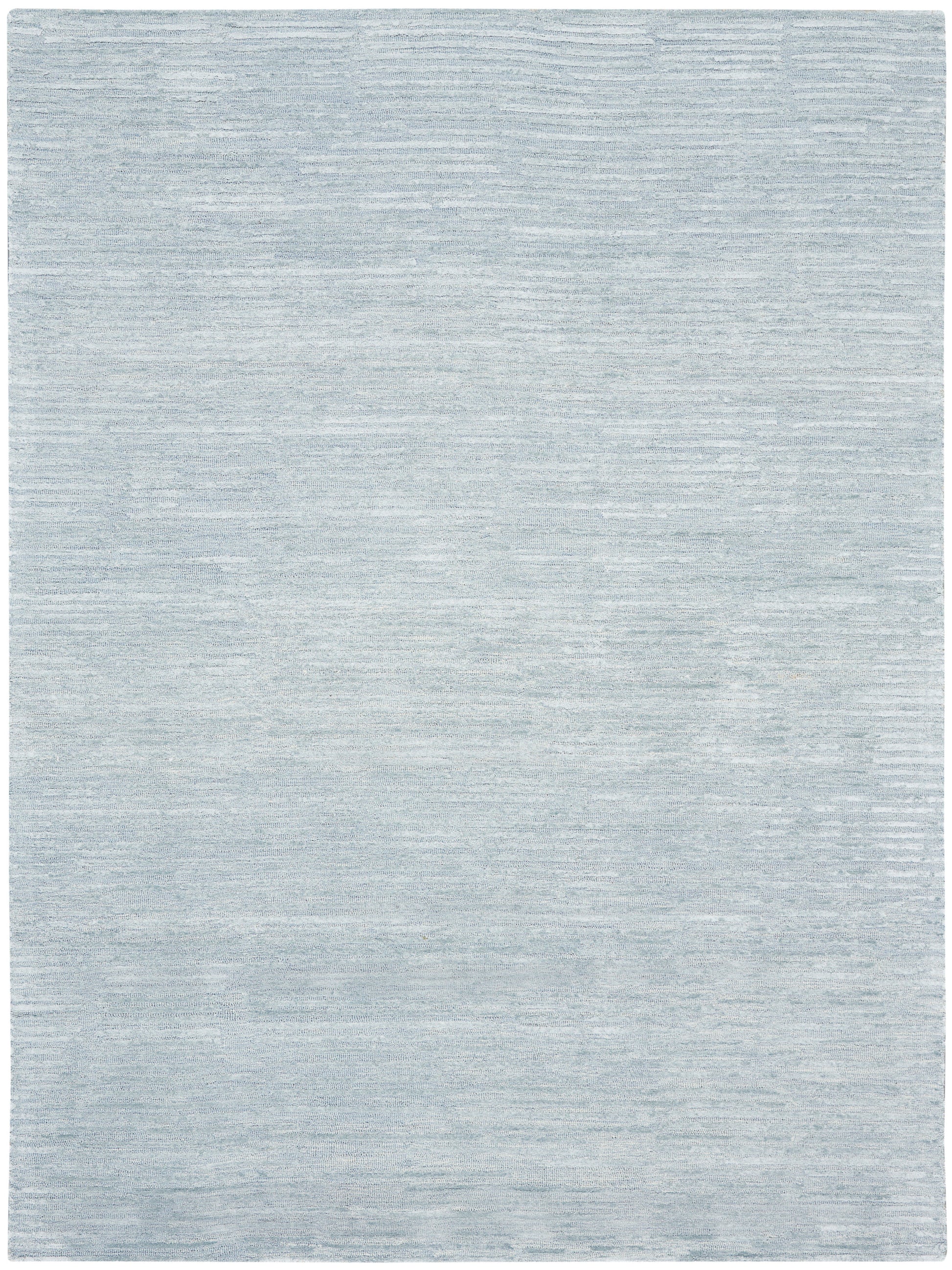 Light blue-gray rug with soft, subtle tonal variations and a flat-weave texture; rectangular, modern living room decor.