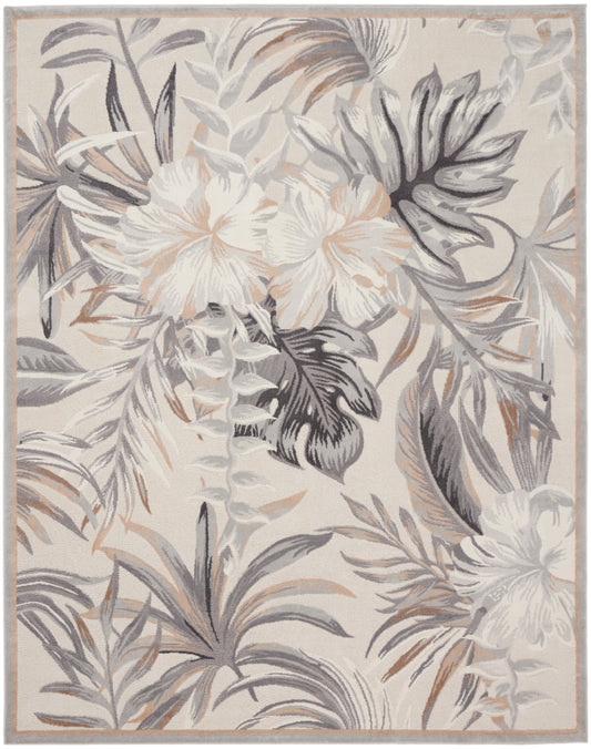 Rectangular area rug with tropical floral pattern in beige, gray, and peach tones; soft neutral leaves and blossoms.