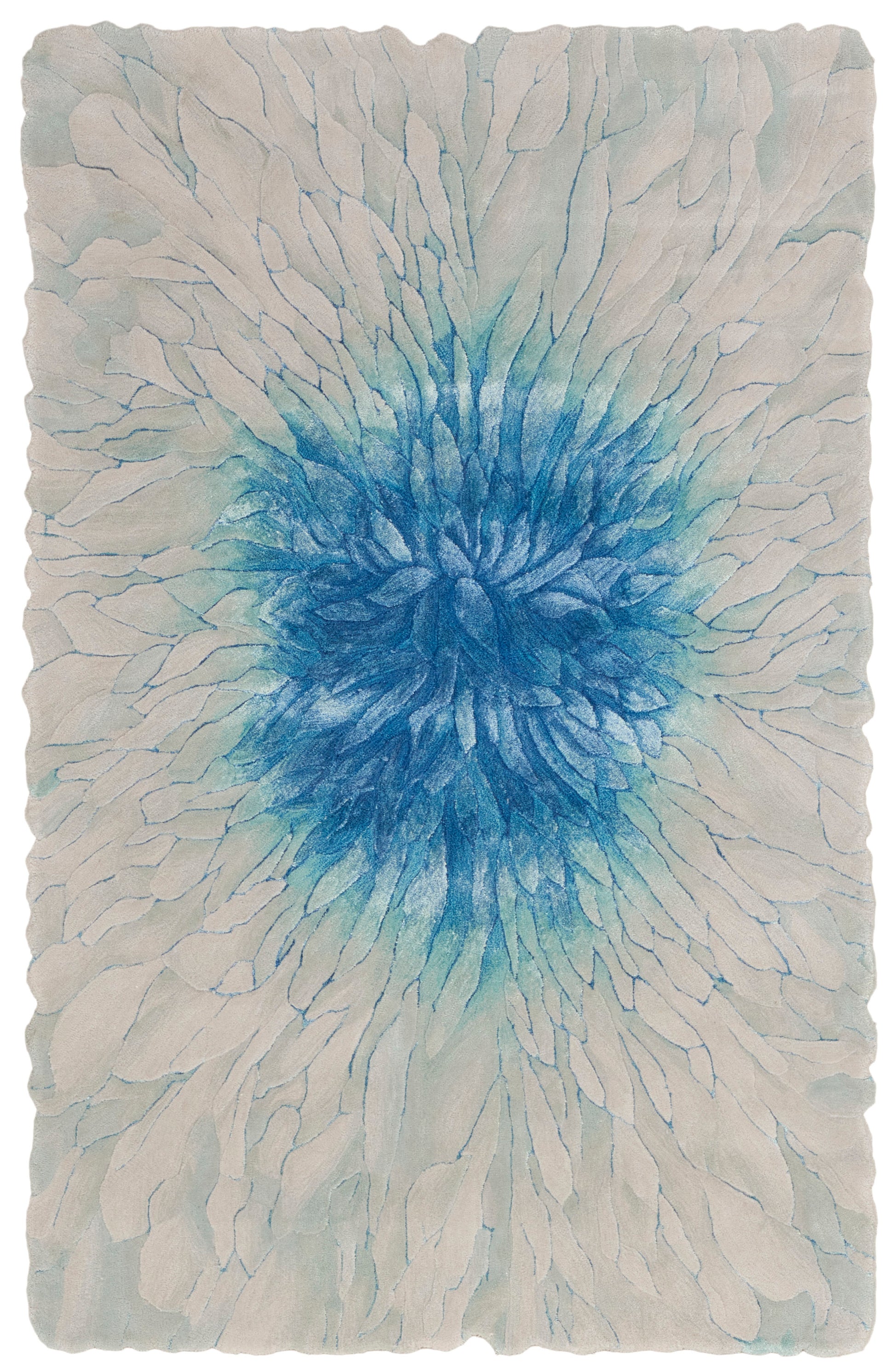 Blue center burst rug on pale white background with radiating petal-like shapes and rough torn edges