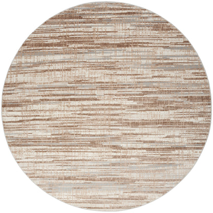 Round area rug in neutral beige and tan tones with abstract horizontal brushstroke pattern.