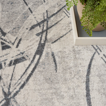 Light gray textured rug with abstract charcoal lines; 5' x 7' modern rug
