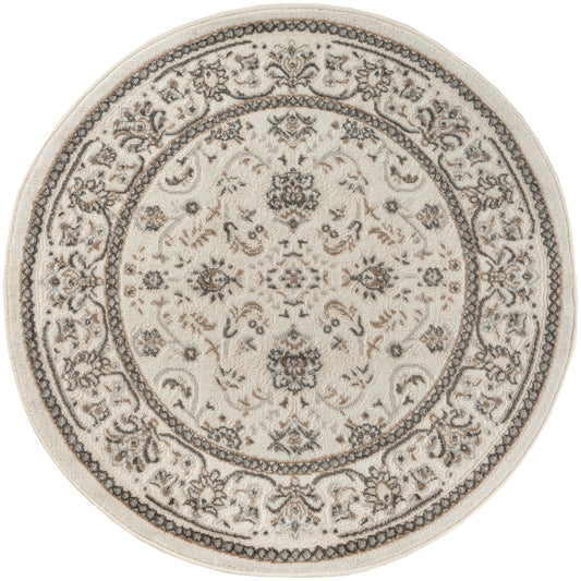 Round beige oriental rug with ornate gray floral medallion center and decorative border.