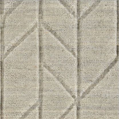 Beige geometric rug with raised diamond motif and loop-pile texture.