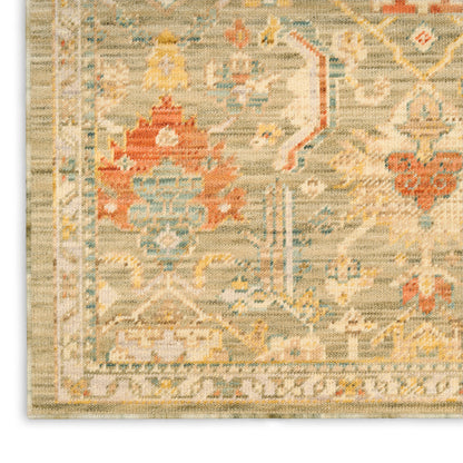 Corner of a beige oriental runner with floral motifs in pale blue, peach and rust; fringed edge.