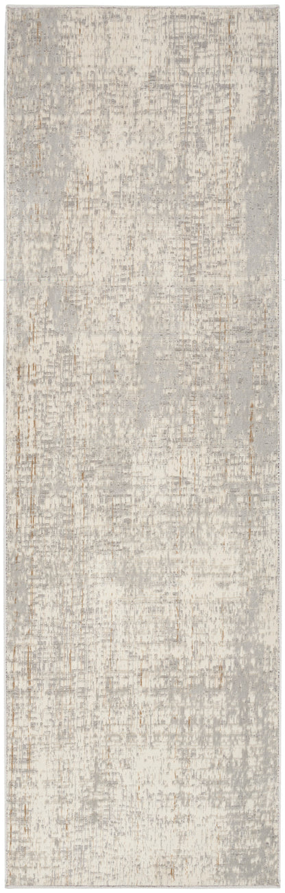Long rectangular runner rug in soft gray and ivory with a distressed abstract pattern and subtle taupe accents.