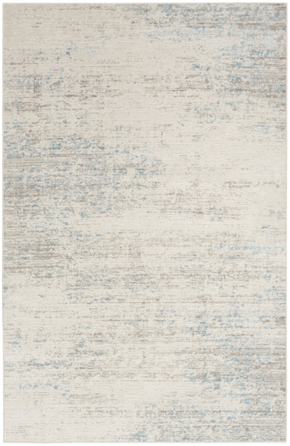 Cream-colored abstract distressed rug, 3' x 5', with pale blue-gray wash and subtle texture.