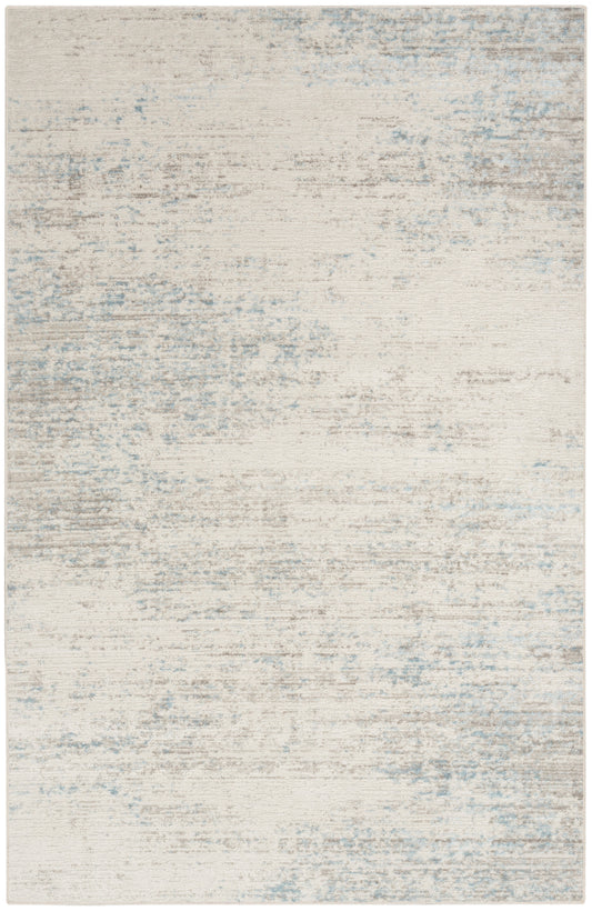 Cream-colored abstract distressed rug, 3' x 5', with pale blue-gray wash and subtle texture.