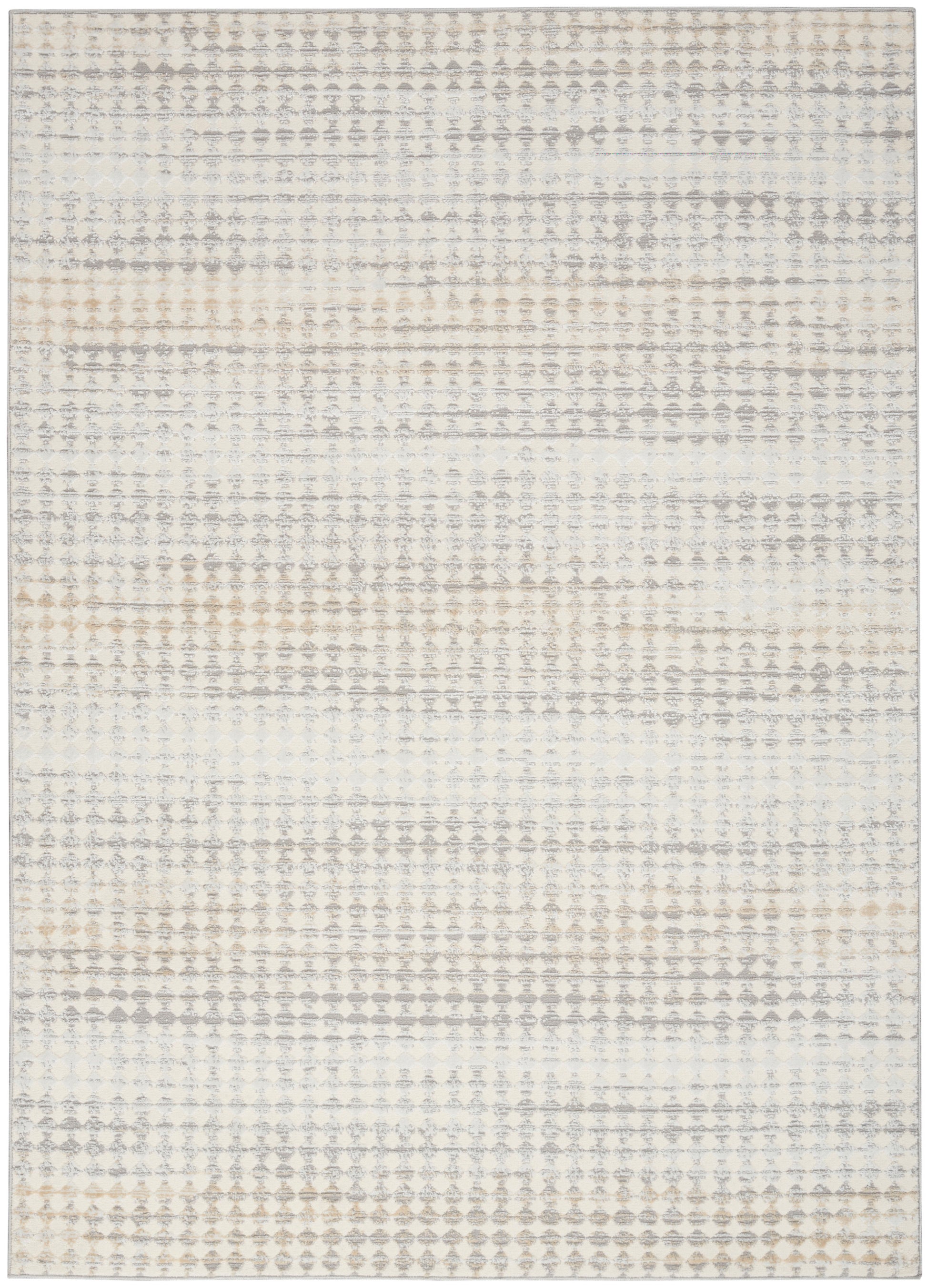 Neutral-toned area rug with a subtle geometric diamond-dot pattern in cream, gray and tan.