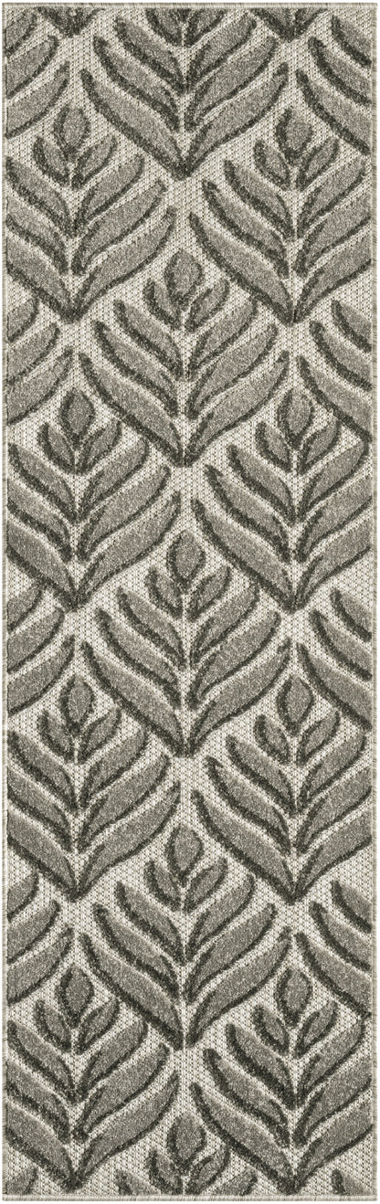 Grey & beige woven outdoor rug runner with a repeating botanical leaf pattern and a textured surface.