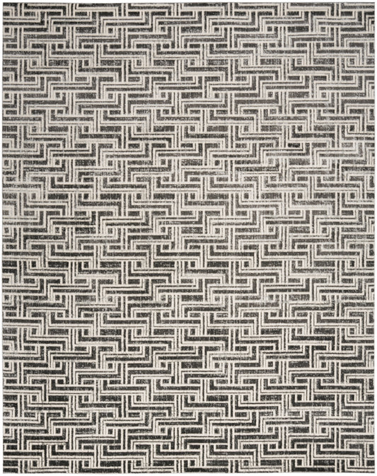 Black on cream Greek-key meander pattern; interlocking rectangular motif on textile texture.