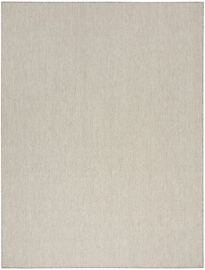 Beige textured fabric with a fine, small-dotted weave pattern.