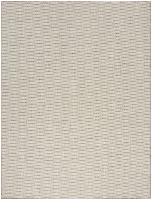 Beige textured fabric with a fine, small-dotted weave pattern.