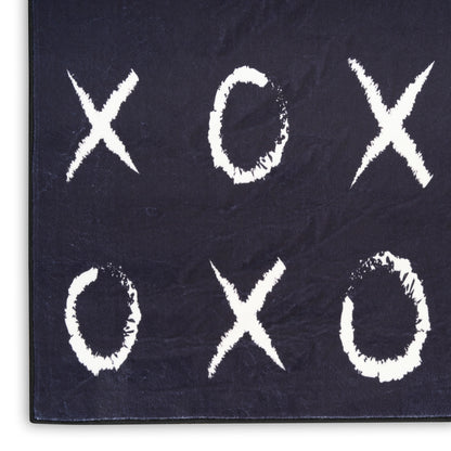 Dark navy textured rug with a white chalky XOXO tic-tac-toe grid.