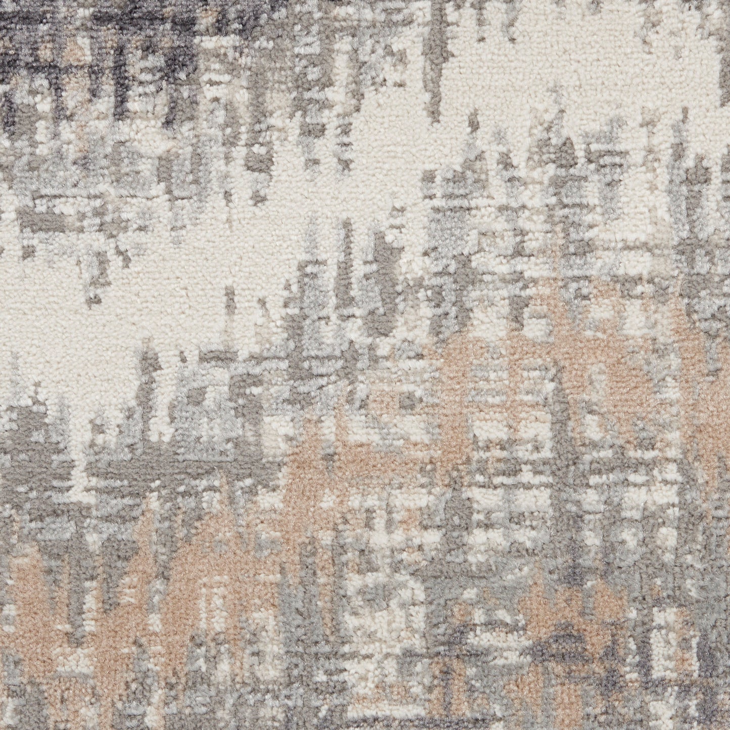 Abstract-pattern rug in ivory, gray and beige with a distressed, painterly motif.