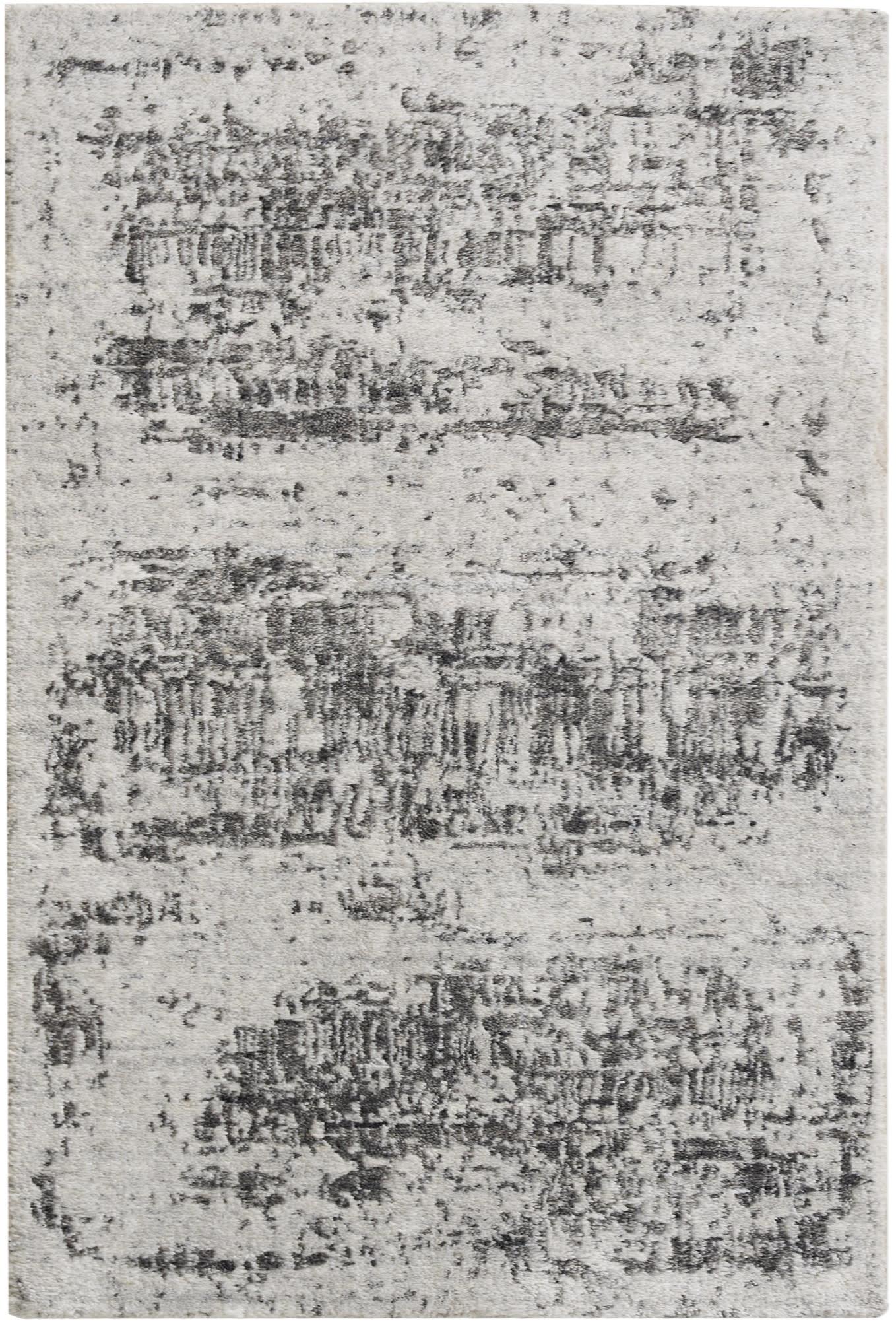 Light gray distressed area rug with irregular charcoal patches, modern style & soft textured pile.