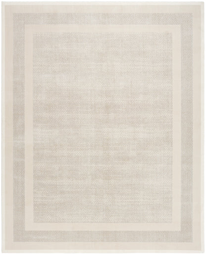 Beige rectangular rug with pale inner and outer borders and subtle woven texture.