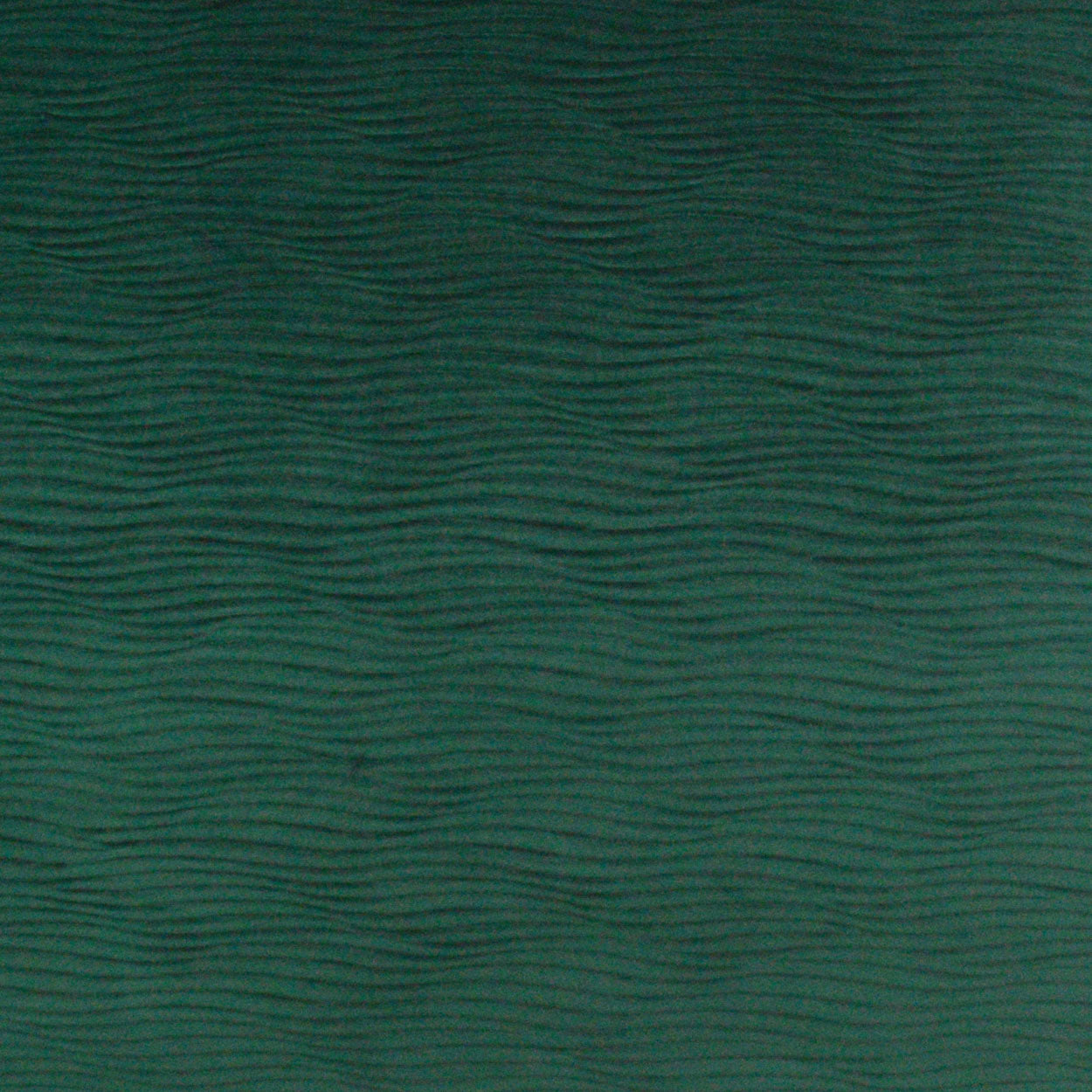 Teal-green pillow fabric with subtle wavy ripple texture and a soft ribbed surface.