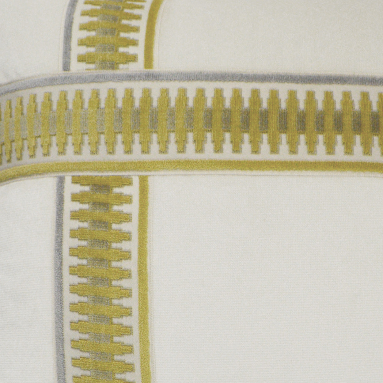Close-up of yellow 24 x 24 inch decorative pillow fabric with band and ribbon trim and a textured weave.